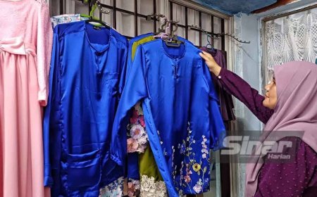 Ibu 7 anak tak menang tangan terima tempahan baju raya